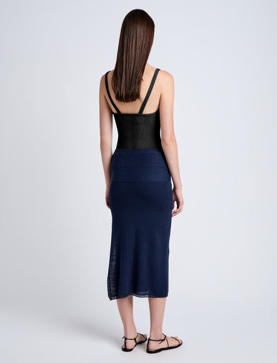 Proenza Schouler Back full length image of model wearing Phelan Knit Skirt in Linen Twist in Navy