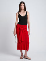 Proenza Schouler Front full length image of model wearing Phelan Knit Skirt in Linen Twist in Dark Poppy