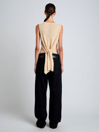 Proenza Schouler Back full length image of model wearing Heyde Knit Sweater in Linen Twist in Light Wheat