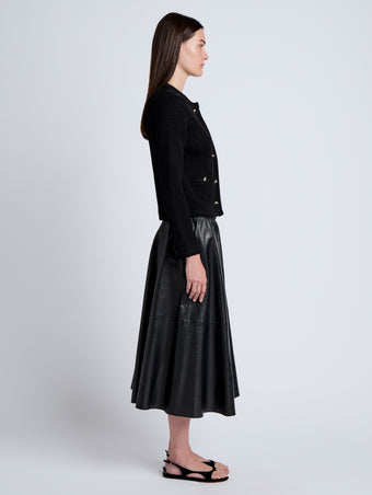 Proenza Schouler Side full length image of model wearing Wilson Knit Jacket in Dry Rib in Black