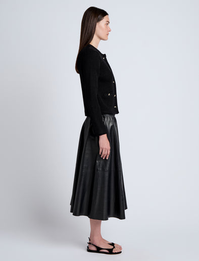 Proenza Schouler Side full length image of model wearing Wilson Knit Jacket in Dry Rib in Black