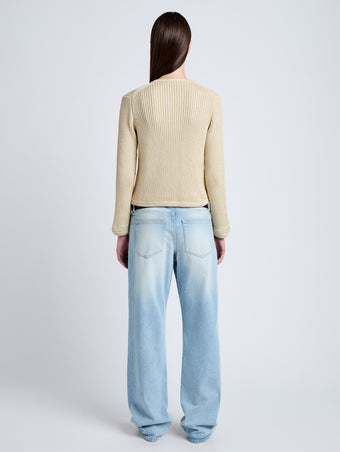 Proenza Schouler Back full length image of model wearing Wilson Knit Jacket in Dry Rib in Light Wheat