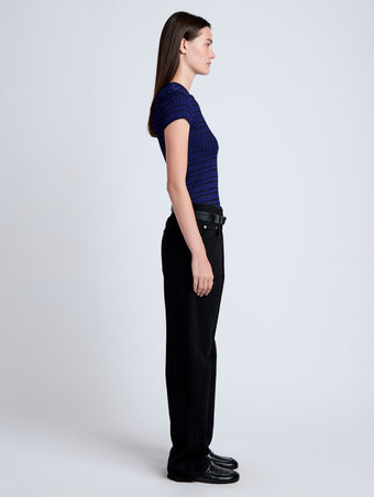 Proenza Schouler side image of model wearing Shelle Sweater in Micro Check in ink/black