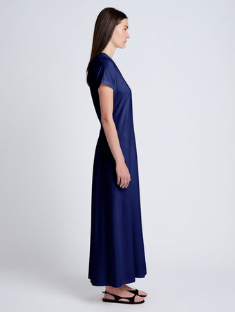 Proenza Schouler side image of model wearing Noelle Dress in Jersey in dark ink