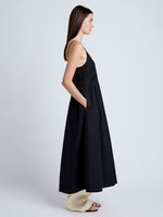 Proenza Schouler Side full length image of model wearing Barker Dress in Stretch Poplin in Black