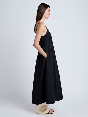 Proenza Schouler Side full length image of model wearing Barker Dress in Stretch Poplin in Black