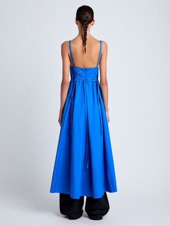 Proenza Schouler Back full length image of model wearing Barker Dress in Stretch Poplin in Cyan