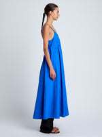 Proenza Schouler Side full length image of model wearing Barker Dress in Stretch Poplin in Cyan
