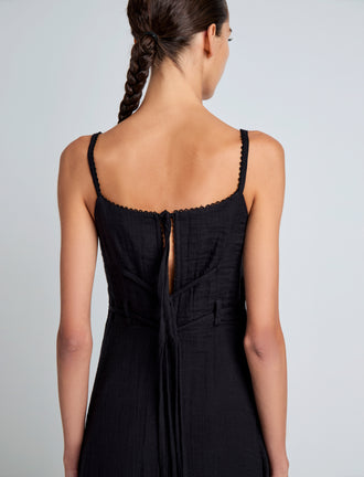 Proenza Schouler Detail image of model wearing Evelyn Dress in Crinkle Viscose in Black