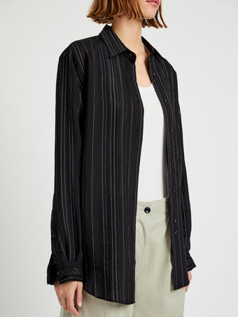 Proenza Schouler detail image of model wearing Raven Shirt in Woven Stripe Flou in black/chalk