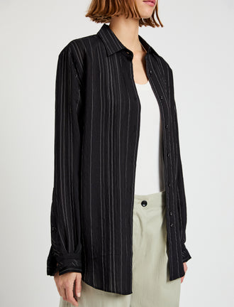 Proenza Schouler detail image of model wearing Raven Shirt in Woven Stripe Flou in black/chalk