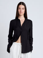 Proenza Schouler Front cropped image of model wearing Cami Shirt in Crinkle Viscose in Black