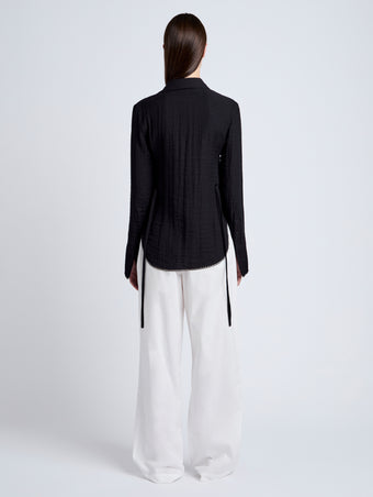 Proenza Schouler Back full length image of model wearing Cami Shirt in Crinkle Viscose in Black