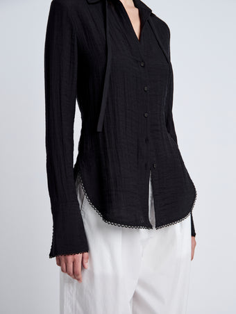 Proenza Schouler Detail image of model wearing Cami Shirt in Crinkle Viscose in Black