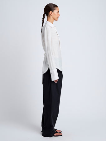 Proenza Schouler Side full length image of model wearing Cami Shirt in Crinkle Viscose in White