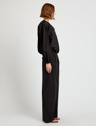 Proenza Schouler side image of model wearing Wendy Top in Tech Poplin in black