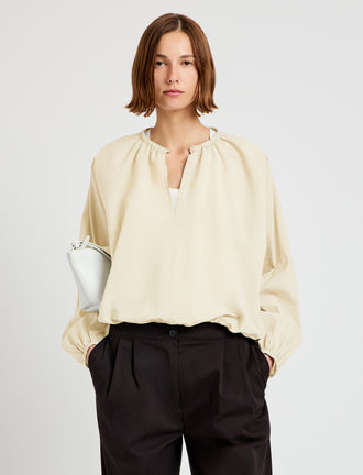 Proenza Schouler Front cropped image of model wearing Wendy Top in Tech Poplin in Light Butter