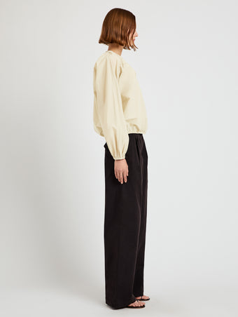 Proenza Schouler Side image of model wearing Wendy Top in Tech Poplin in Light Butter