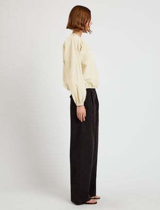Proenza Schouler Side image of model wearing Wendy Top in Tech Poplin in Light Butter