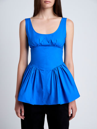 Proenza Schouler Detail image of model wearing Bader Top in Stretch Poplin in Cyan