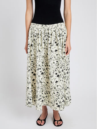 Proenza Schouler detail image of model wearing Austin Skirt in Printed Poplin in light butter/black