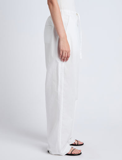 Proenza Schouler Cropped Side image of model wearing Barrett Pant in Stretch Poplin in White