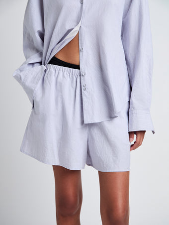 Proenza Schouler Detail image of model wearing Jana Short in Linen Shirting in Light Oxford Melange