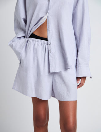 Proenza Schouler Detail image of model wearing Jana Short in Linen Shirting in Light Oxford Melange