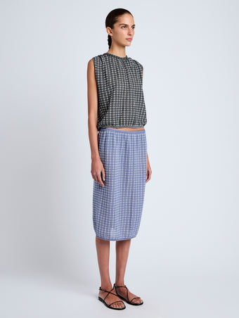 Proenza Schouler side image of model wearing Bradley Crewneck in Plaid Knit in off white/black