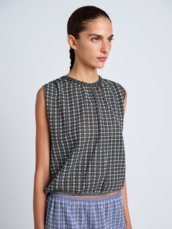 Proenza Schouler detail image of model wearing Bradley Crewneck in Plaid Knit in off white/black