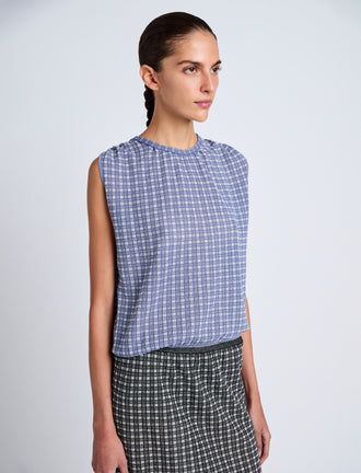 Proenza Schouler detail image of model wearing Bradley Crewneck in Plaid Knit in off white/denim