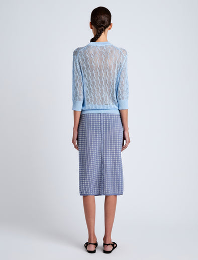 Proenza Schouler back image of model wearing Lori Knit Skirt in Plaid Knit in off white/denim