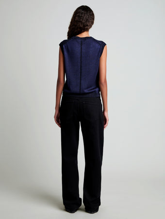 Proenza Schouler Back full length image of model wearing Emily Sweater in Plaited Viscose Rib in Dark Ink