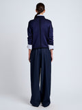 Proenza Schouler Back full length image of model wearing Shea Sweater in Plaited Viscose Rib in Dark Ink