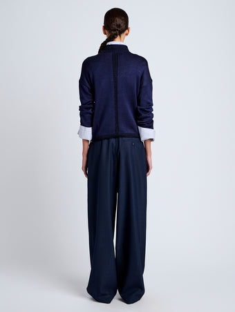 Proenza Schouler Back full length image of model wearing Shea Sweater in Plaited Viscose Rib in Dark Ink