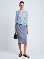 Proenza Schouler Front full length image of model wearing Nicola Knit Sweater in Plaited Viscose Rib in Light Oxford