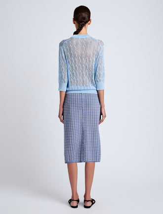 Proenza Schouler Back full length image of model wearing Nicola Knit Sweater in Plaited Viscose Rib in Light Oxford