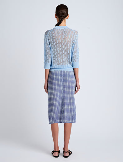 Proenza Schouler Back full length image of model wearing Nicola Knit Sweater in Plaited Viscose Rib in Light Oxford