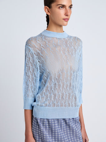 Proenza Schouler Detail image of model wearing Nicola Knit Sweater in Plaited Viscose Rib in Light Oxford