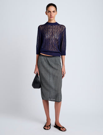Proenza Schouler Front full length image of model wearing Nicola Knit Sweater in Plaited Viscose Rib in Dark Ink
