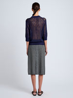 Proenza Schouler Back full length image of model wearing Nicola Knit Sweater in Plaited Viscose Rib in Dark Ink