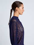 Proenza Schouler Detail image of model wearing Nicola Knit Sweater in Plaited Viscose Rib in Dark Ink