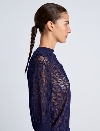 Proenza Schouler Detail image of model wearing Nicola Knit Sweater in Plaited Viscose Rib in Dark Ink