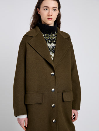 Proenza Schouler Detail image of model wearing Tammy Coat in Double Face Wool in Fatigue