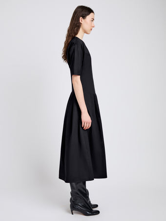 Proenza Schouler Side full length image of model wearing Ainsley Dress in Tech Cotton in Black