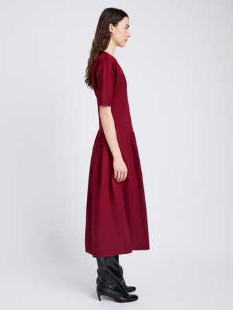 Proenza Schouler Side full length image of model wearing Ainsley Dress in Tech Cotton in Claret