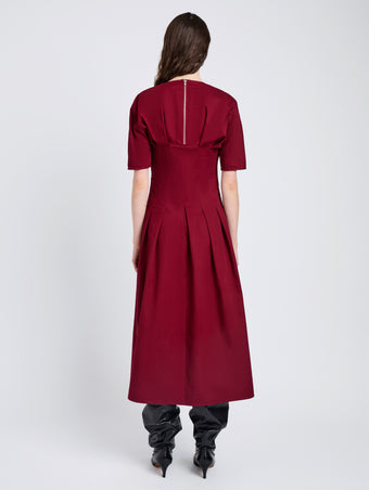 Proenza Schouler Back full length image of model wearing Ainsley Dress in Tech Cotton in Claret