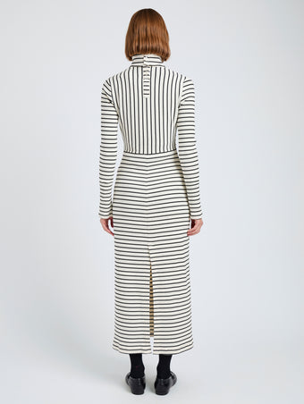 Proenza Schouler Side Back length image of model wearing Frances Dress in Stripe Rib in Ecru, black