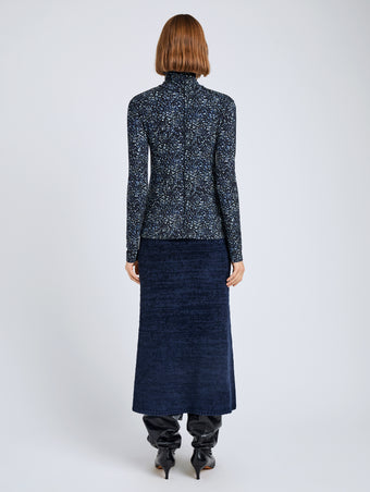Proenza Schouler Back full length image of model wearing Audrey Top in Cheetah Jersey in Navy Multi