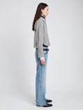 Proenza Schouler Side full length image of model wearing Olive Shirt in Stripe Cotton in Parchment, dark teal